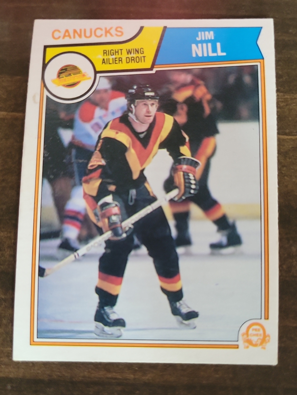 1983/84 OPC Vancouver Canucks Jim Nill Hockey Card - Black, Yellow, Red